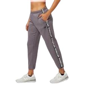 Jogger lila terry c/ cinta lat NEW BALANCE